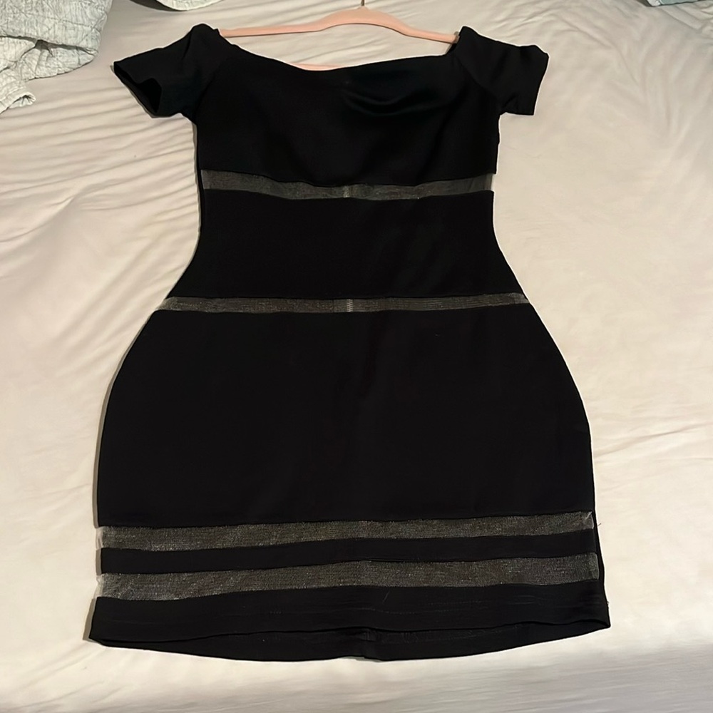 Black dress, fitting to body, stretchy